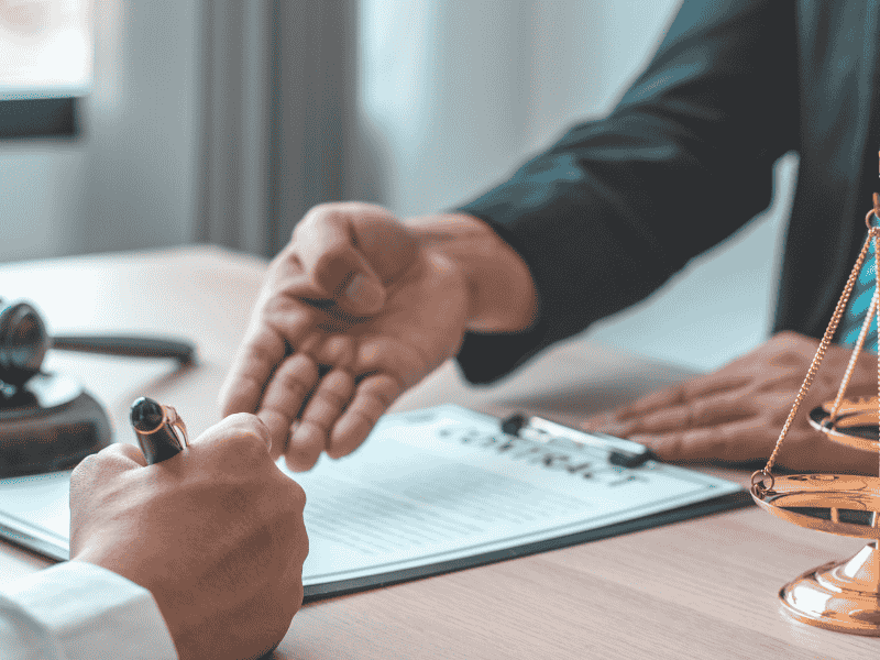 How should an enterprise properly handle a customer's claim for compensation arising from capital reduction while remaining compliant with the law?