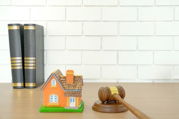 Giải quyết tranh chấp đất đai đã có sổ đỏ như thế nào?